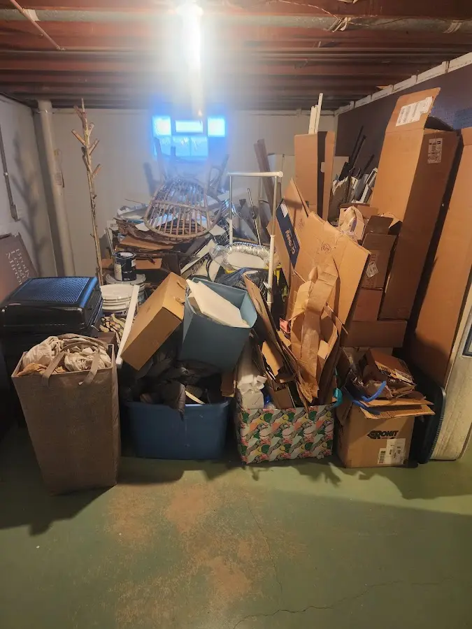 Roll-off dumpster container at job site for 15 Yard Dumpster Rental in Hayfield